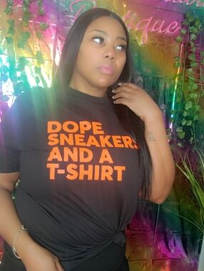 Black Graphic T-Shirt with Bold Orange Text